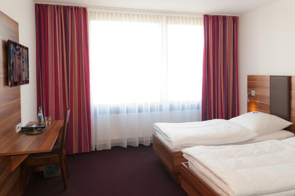 Hotel Sentio Vöhringen Quarto foto